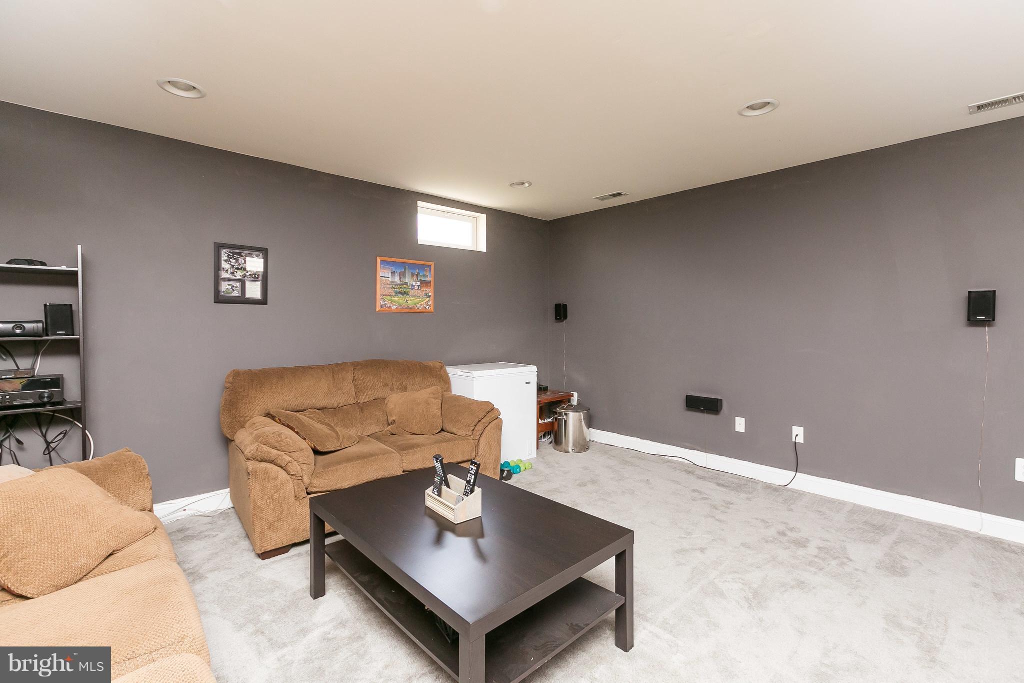 1305 3rd Road Baltimore, MD 21220 - Photo 21 of 27 a living room with furniture and a table