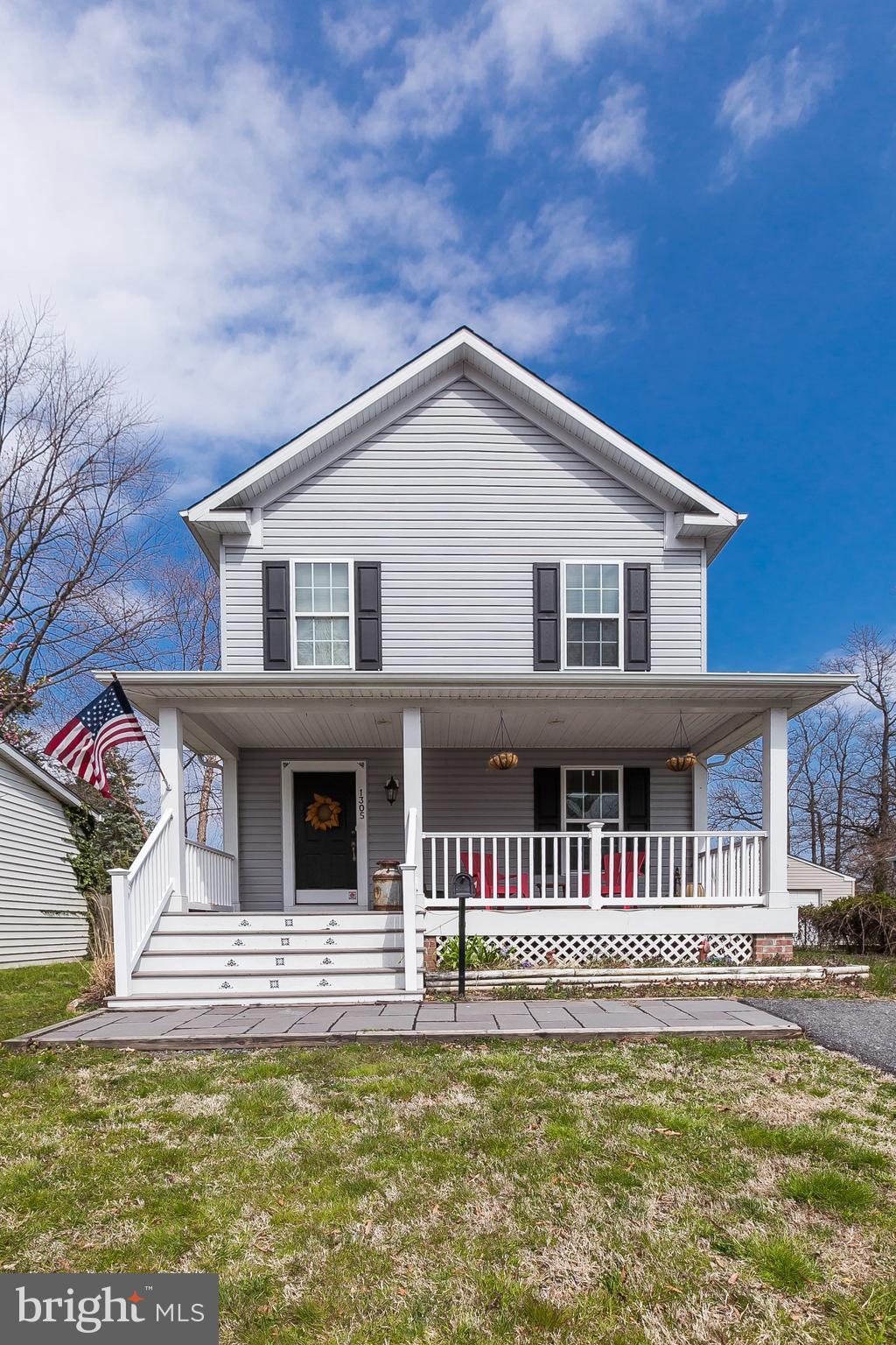 1305 3rd Road Baltimore, MD 21220 - Photo 7 of 27 a front view of a house with a swimming pool