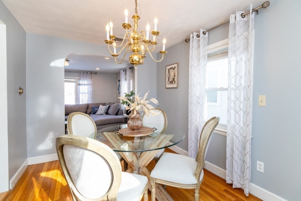 236 Fellsway West Medford, MA 02155 - Photo 11 of 39 a dining room with furniture and chandelier