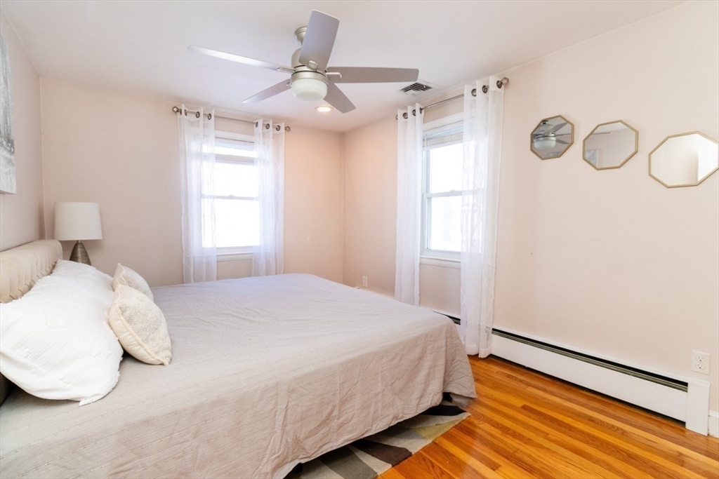 236 Fellsway West Medford, MA 02155 - Photo 18 of 39 a bedroom with a bed and window