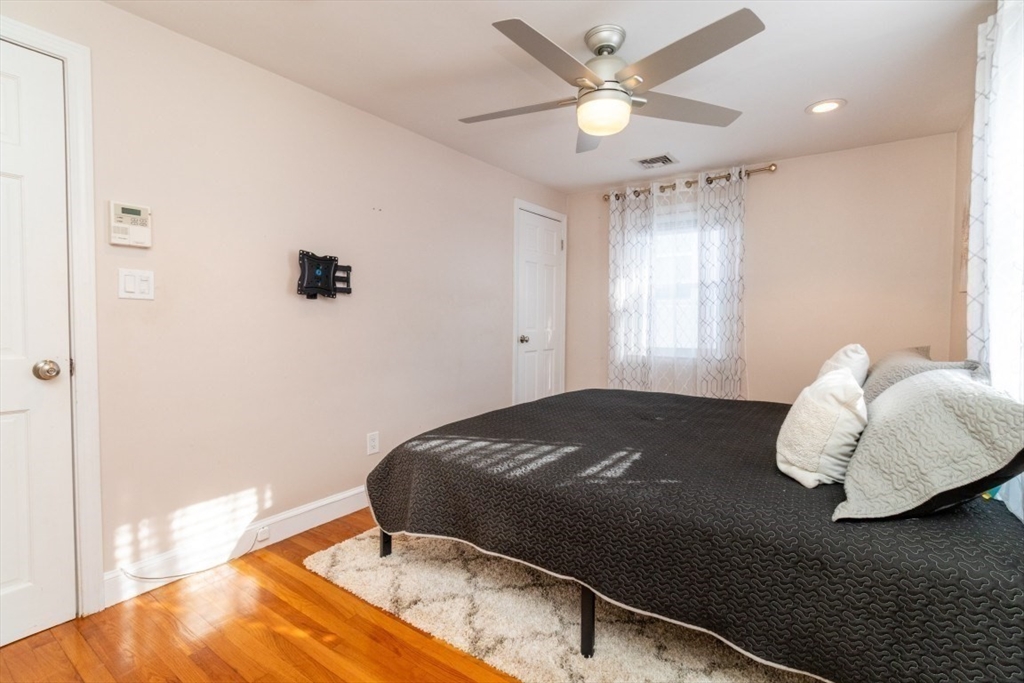 236 Fellsway West Medford, MA 02155 - Photo 21 of 39 a bedroom with a bed and a window