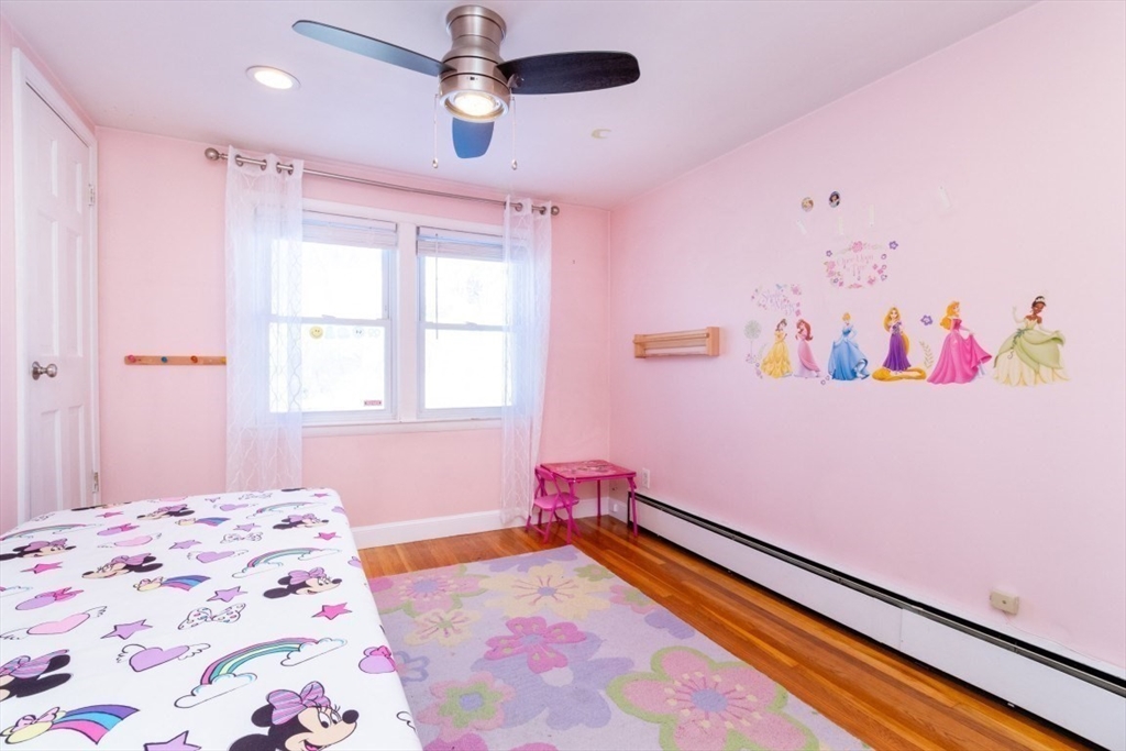 236 Fellsway West Medford, MA 02155 - Photo 24 of 39 a bedroom with a bed and a dresser