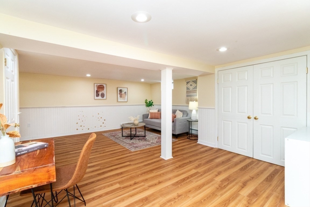 236 Fellsway West Medford, MA 02155 - Photo 30 of 39 a living room with furniture and a wooden floor