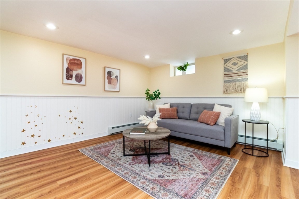 236 Fellsway West Medford, MA 02155 - Photo 32 of 39 a living room with furniture and wooden floor