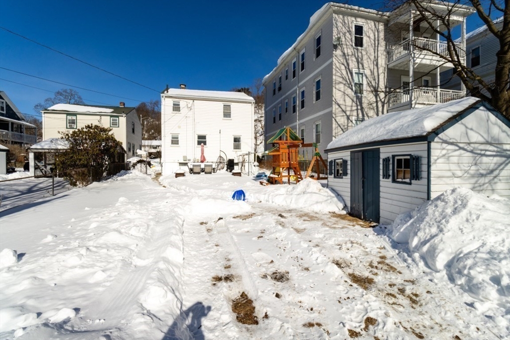 236 Fellsway West Medford, MA 02155 - Photo 34 of 39 a view of roof with a building in the background