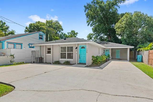 front view of a house with a yard