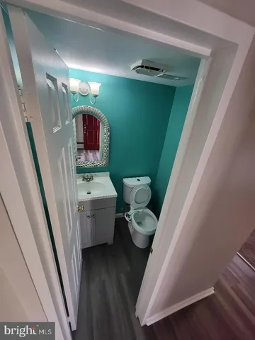 a bathroom with a sink and toilet