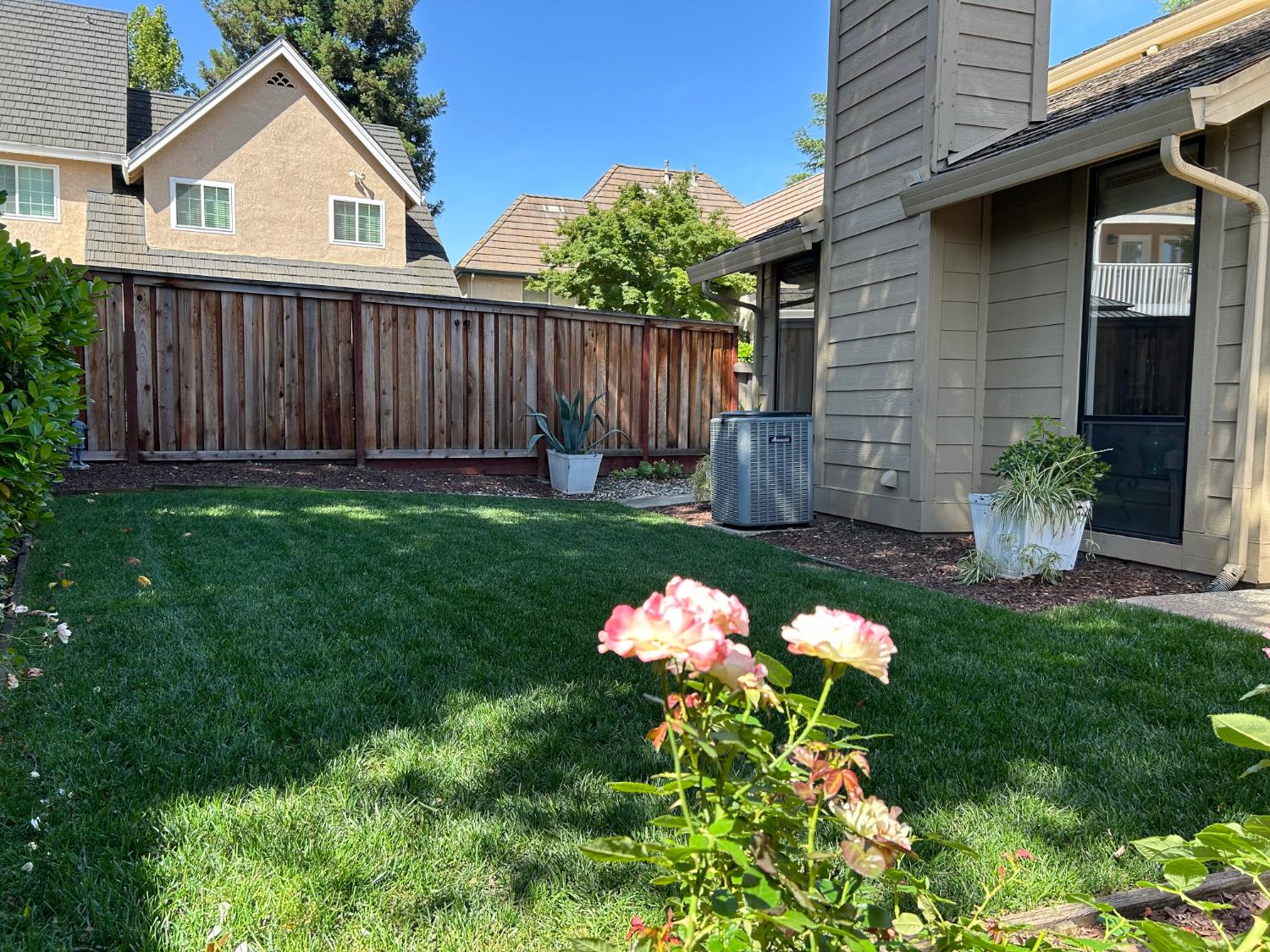 1067 Rio Cidade Way Sacramento, CA 95831 - Photo 22 of 33 a front view of a house with garden