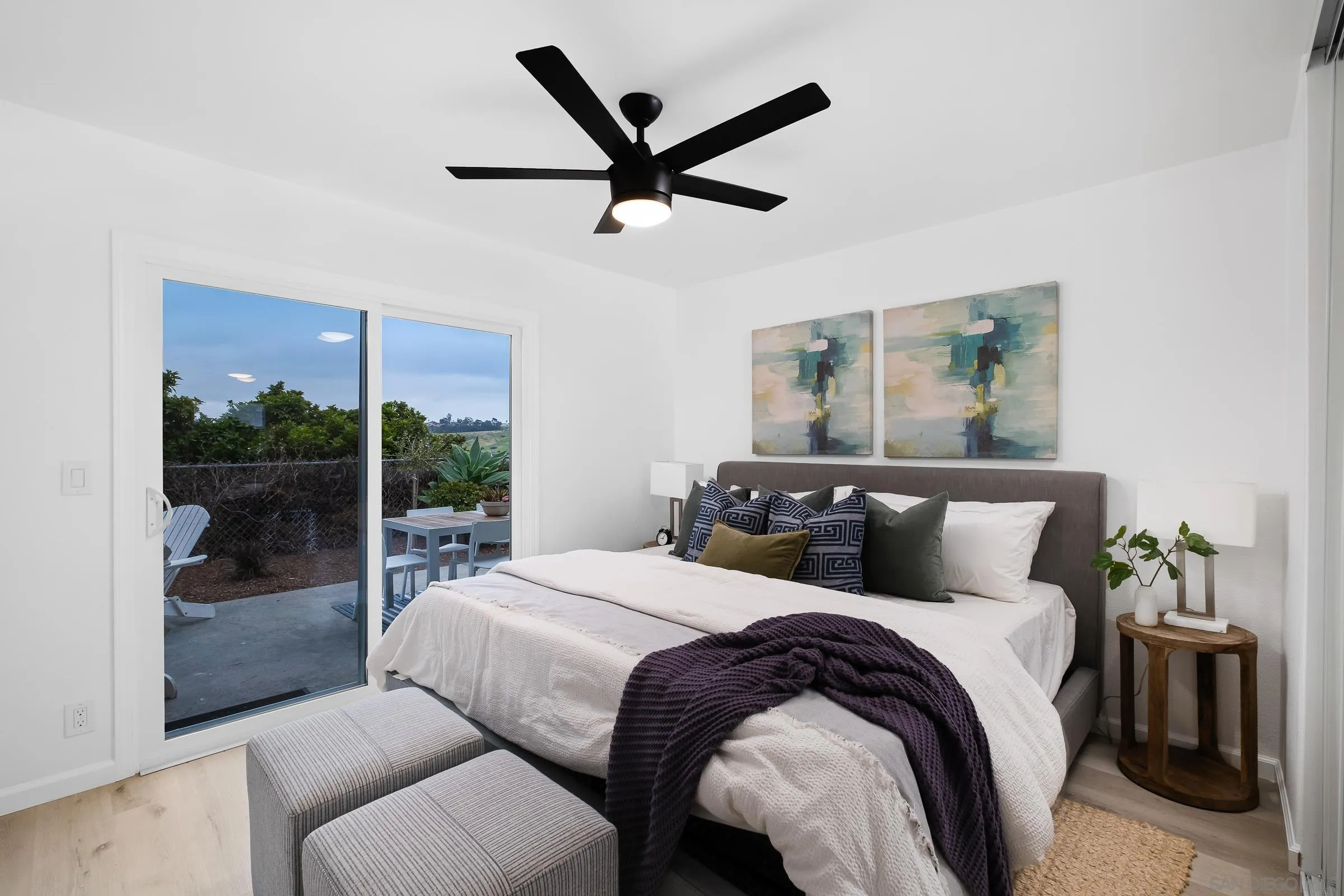 3757 Gail Drive Oceanside, CA 92056 - Photo 12 of 27 a bedroom with a large bed and a large window