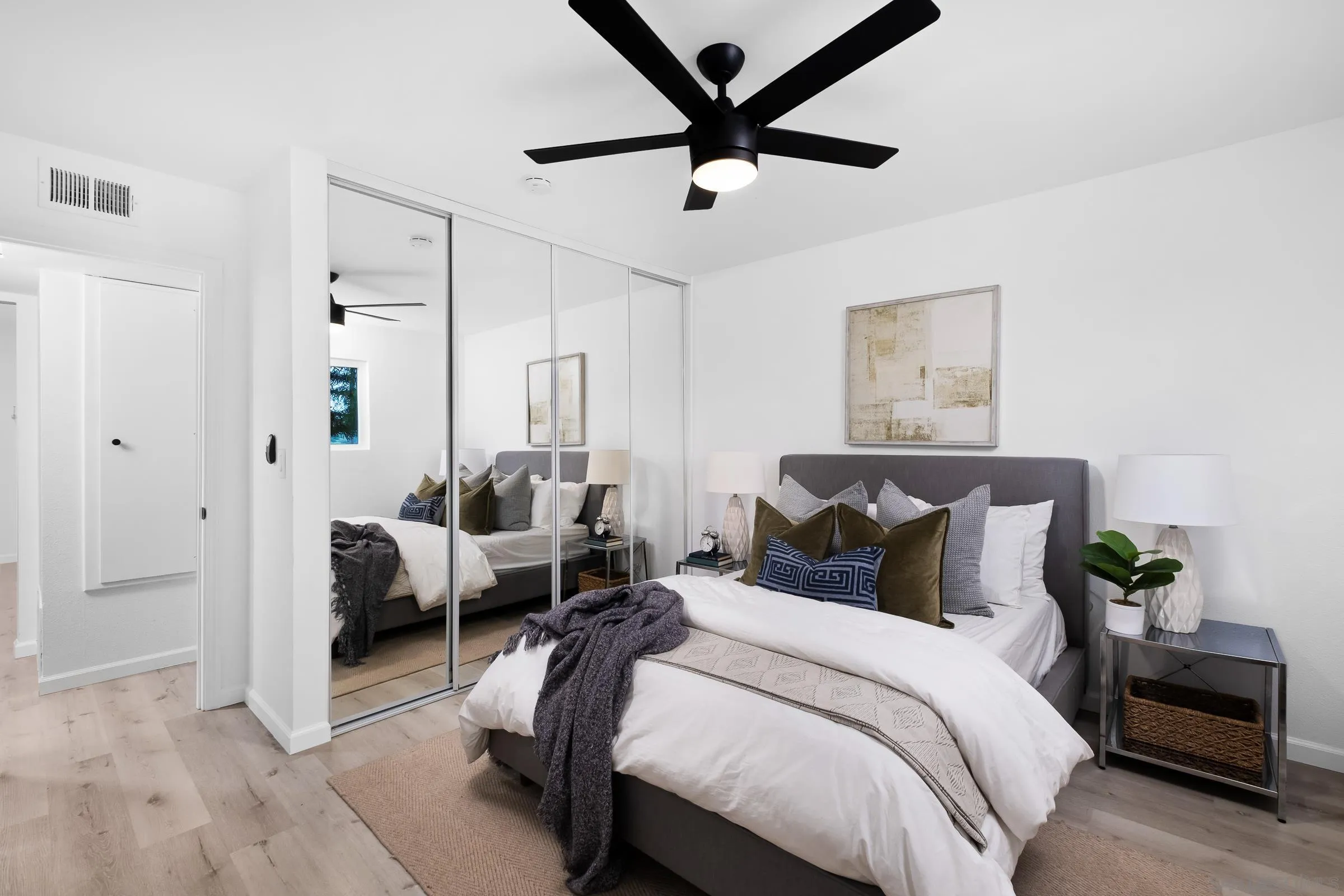 3757 Gail Drive Oceanside, CA 92056 - Photo 15 of 27 a bedroom with a bed couch and a window