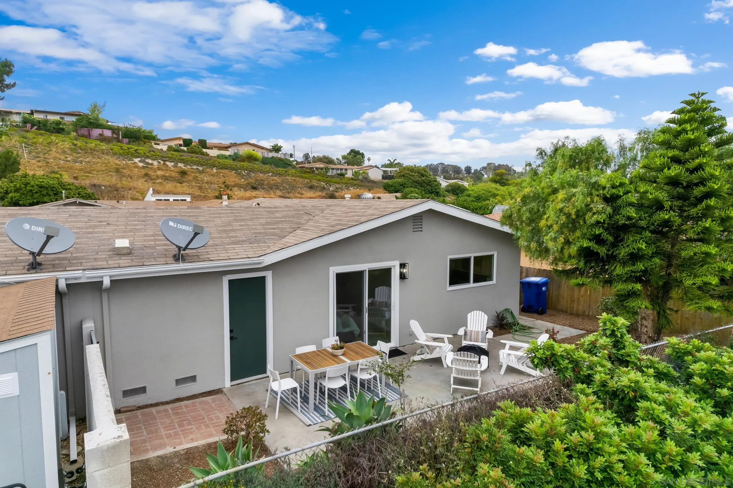 3757 Gail Drive Oceanside, CA 92056 - Photo 18 of 27 a view of house with backyard outdoor seating and green space