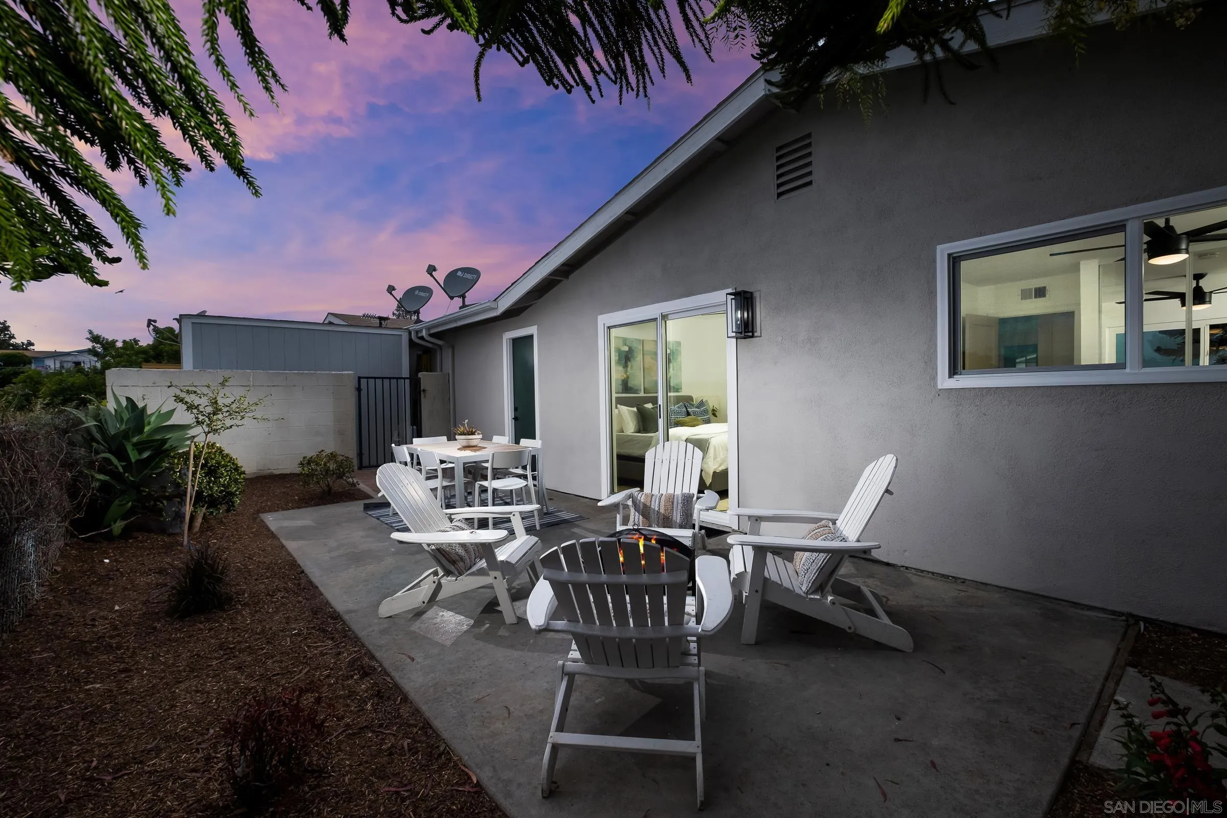 3757 Gail Drive Oceanside, CA 92056 - Photo 20 of 27 a view of a patio with table and chairs and potted plants