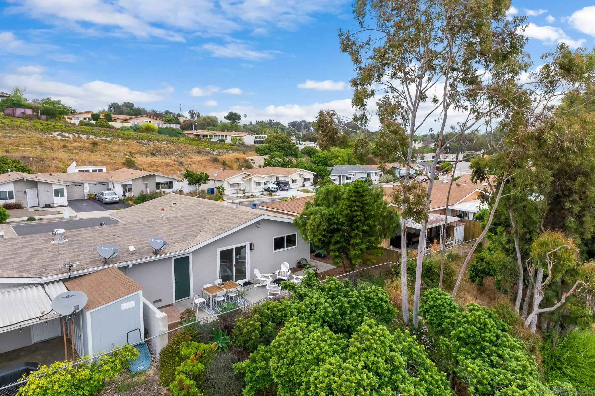 3757 Gail Drive Oceanside, CA 92056 - Photo 23 of 27 a aerial view of a house with big yard and large tree