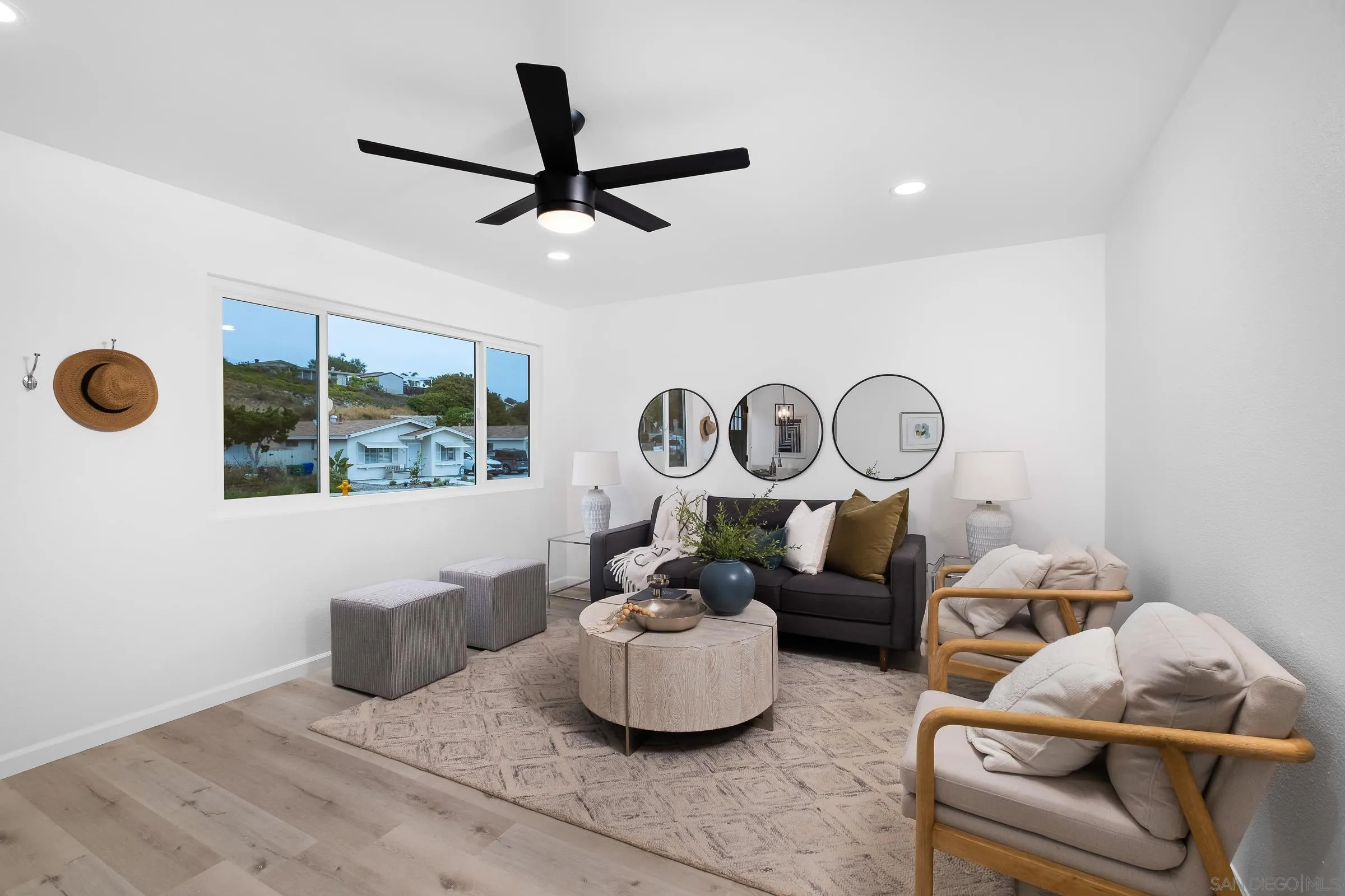 3757 Gail Drive Oceanside, CA 92056 - Photo 4 of 27 a room with furniture and a window