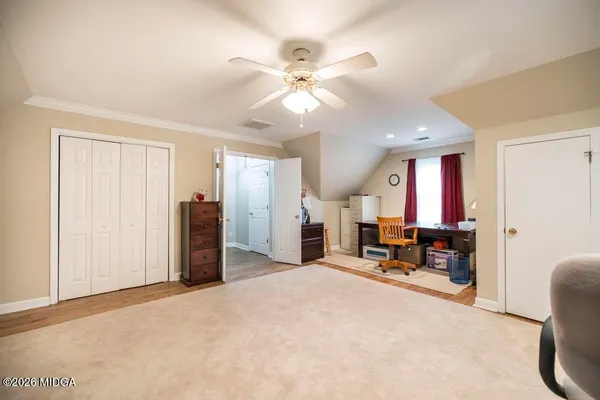 a view of a chairs and table on the wooden floor