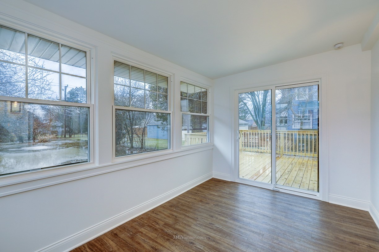 336 Nuttall Road Riverside, IL 60546 - Photo 13 of 34 a view of empty room with wooden floor and fan