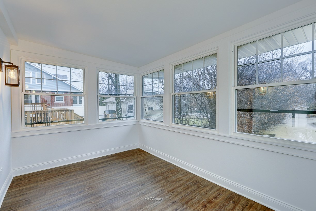 336 Nuttall Road Riverside, IL 60546 - Photo 15 of 34 a view of empty room with wooden floor and fan