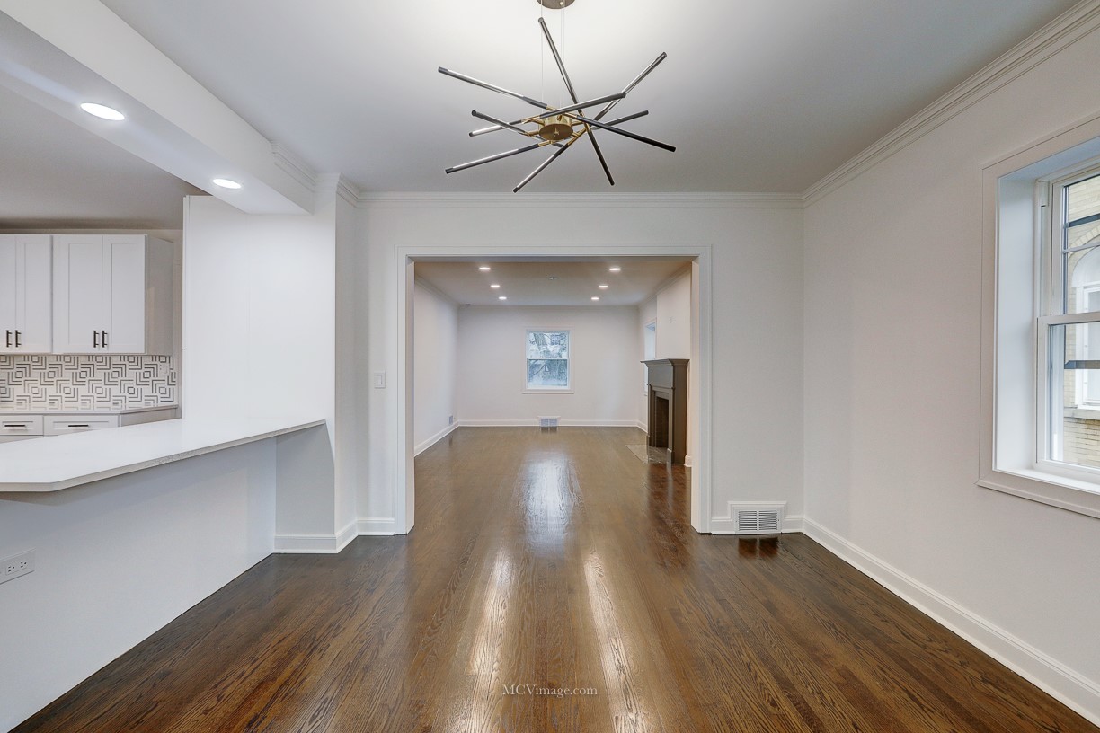 336 Nuttall Road Riverside, IL 60546 - Photo 16 of 34 a view of gallery with wooden floor and a ceiling fan