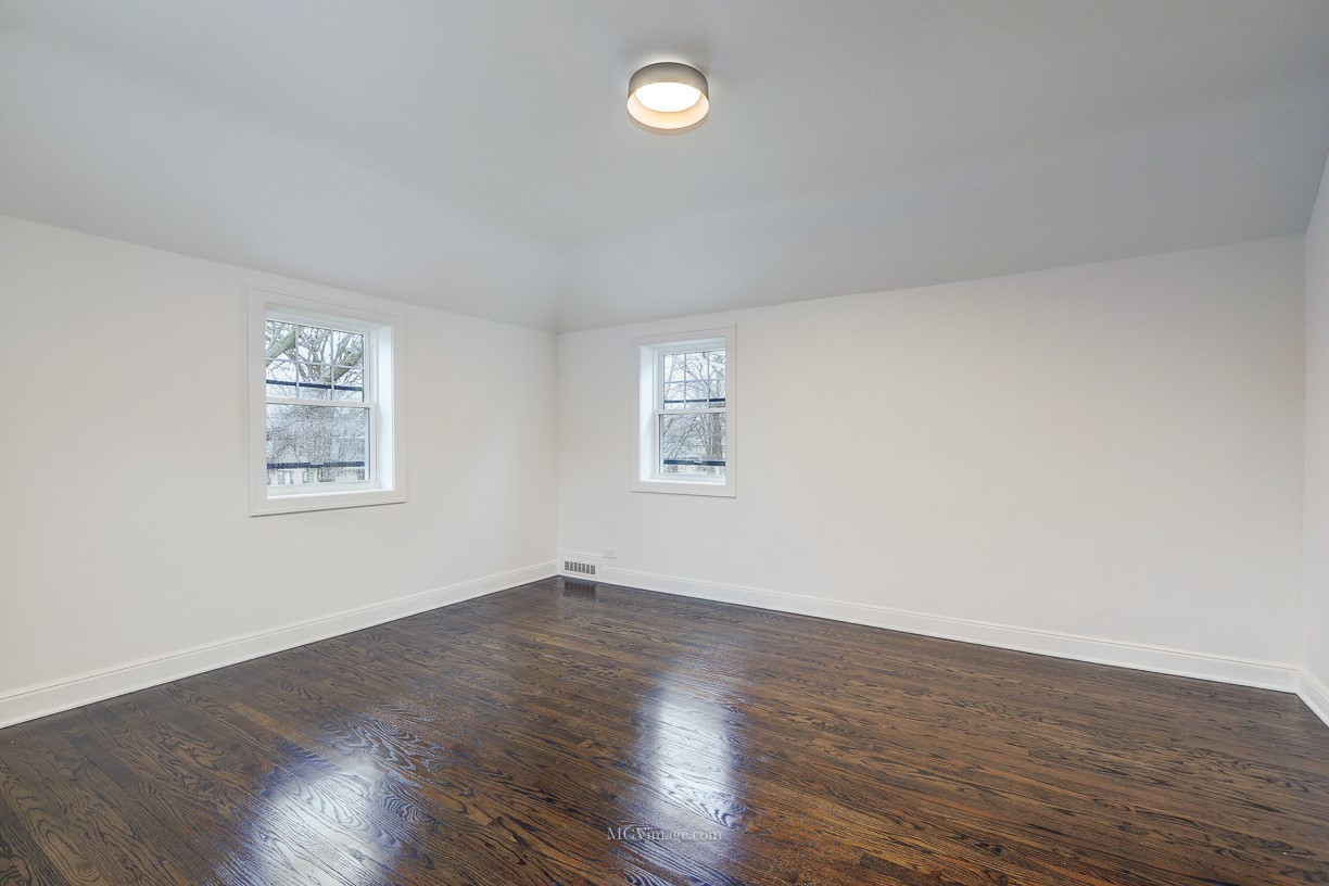336 Nuttall Road Riverside, IL 60546 - Photo 19 of 34 a view of a room with wooden floor and window