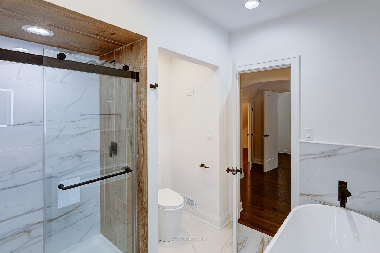 336 Nuttall Road Riverside, IL 60546 - Photo 23 of 34 a bathroom with a shower a toilet and a sink
