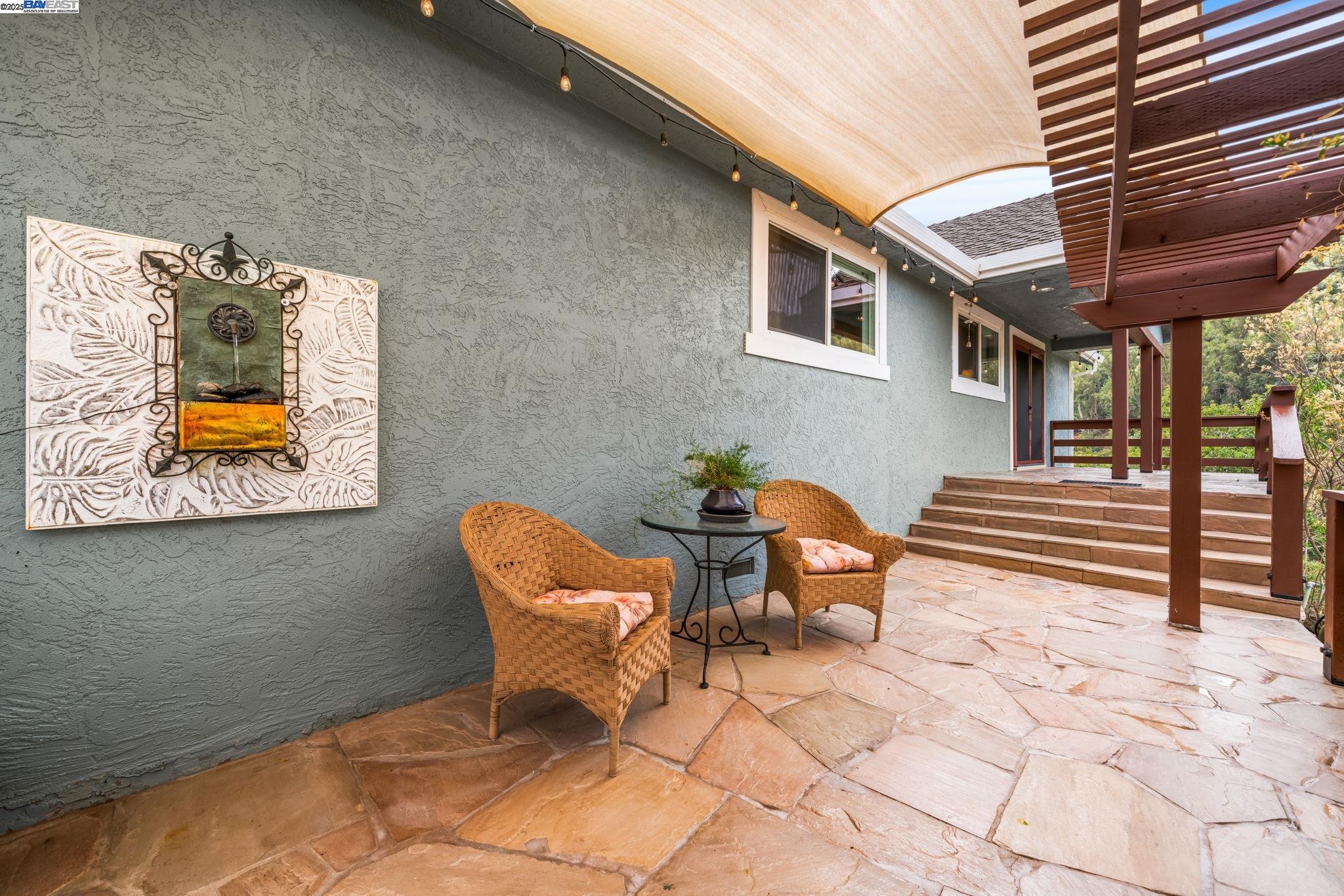26928 Palomares Road Castro Valley, CA 94552 - Photo 15 of 58 a outdoor space with chairs and wooden floor
