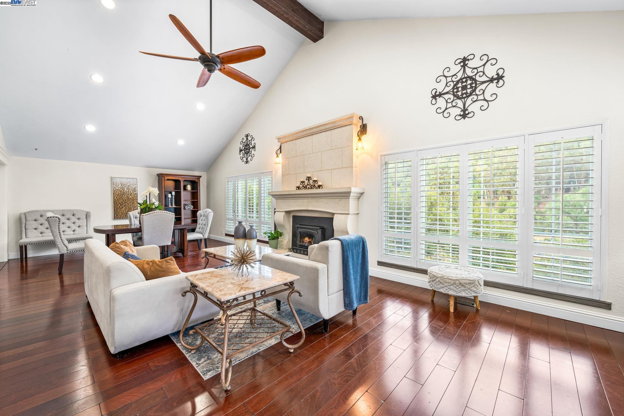 26928 Palomares Road Castro Valley, CA 94552 - Photo 18 of 58 a living room with furniture and a floor to ceiling window