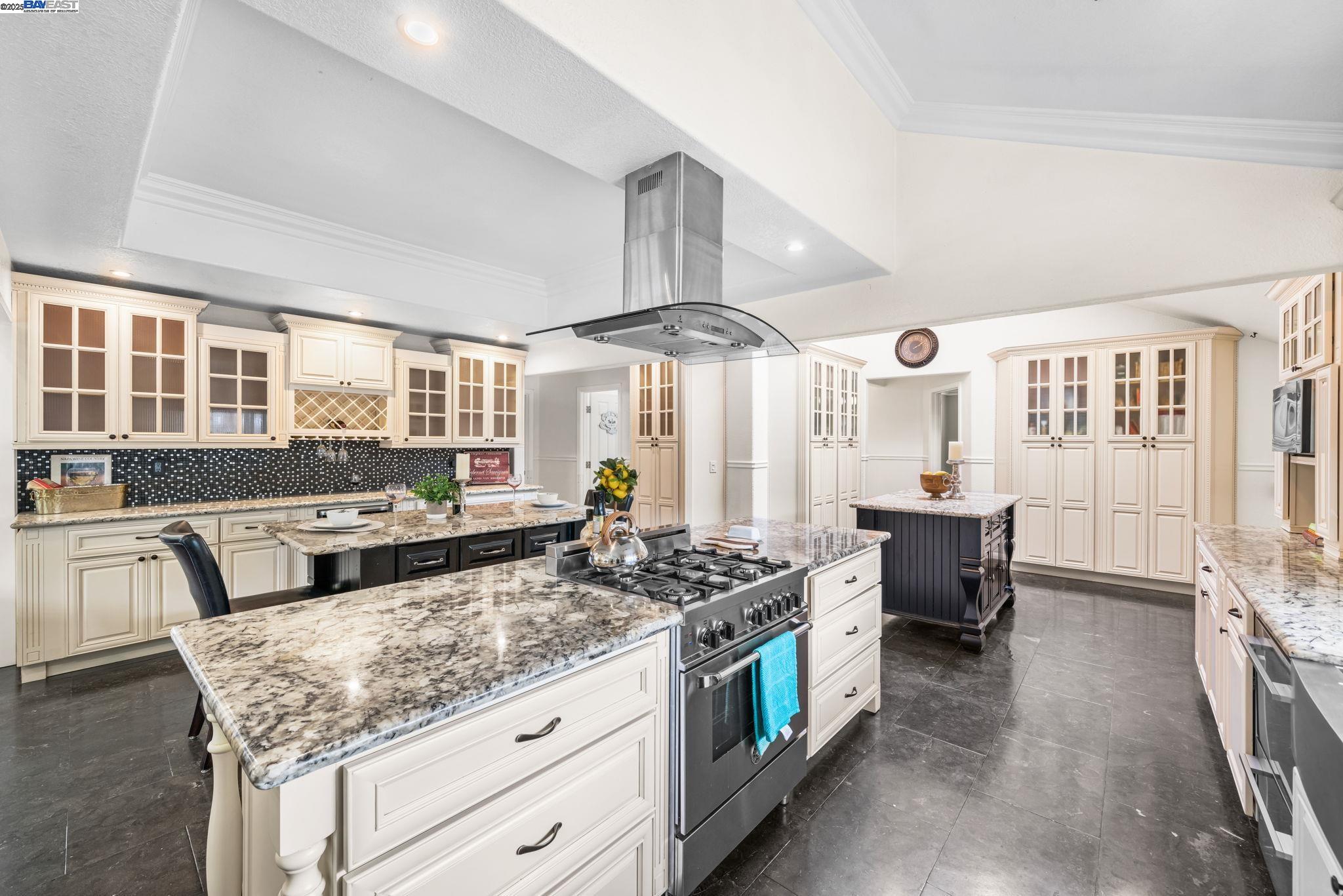 26928 Palomares Road Castro Valley, CA 94552 - Photo 28 of 58 a kitchen with stainless steel appliances granite countertop a stove and a sink