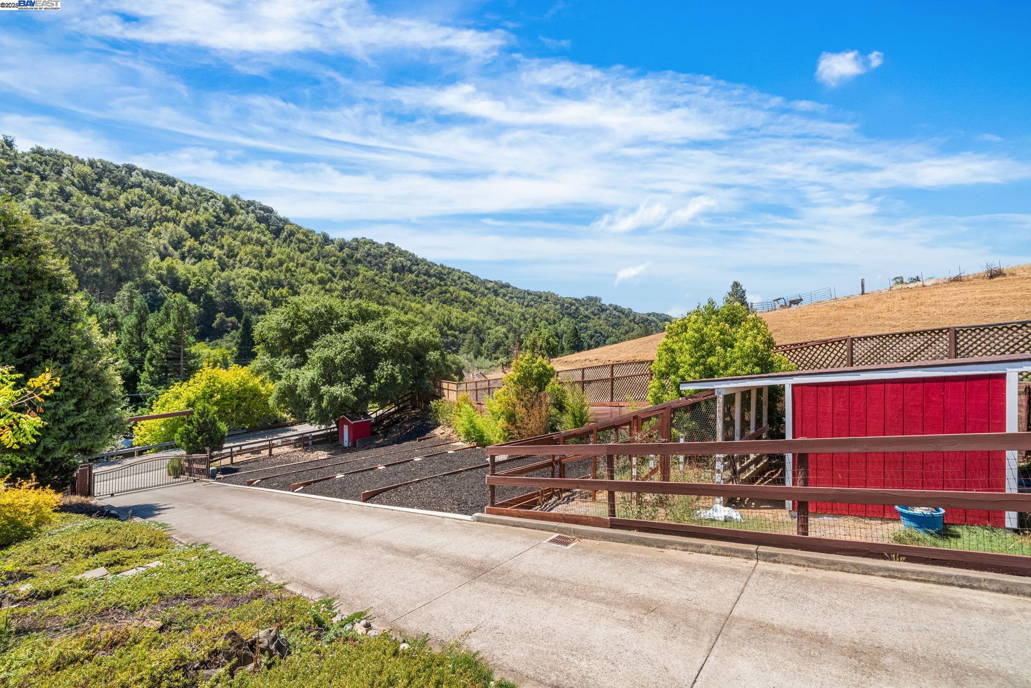 26928 Palomares Road Castro Valley, CA 94552 - Photo 3 of 58 a view of a patio with table and chairs and potted plants