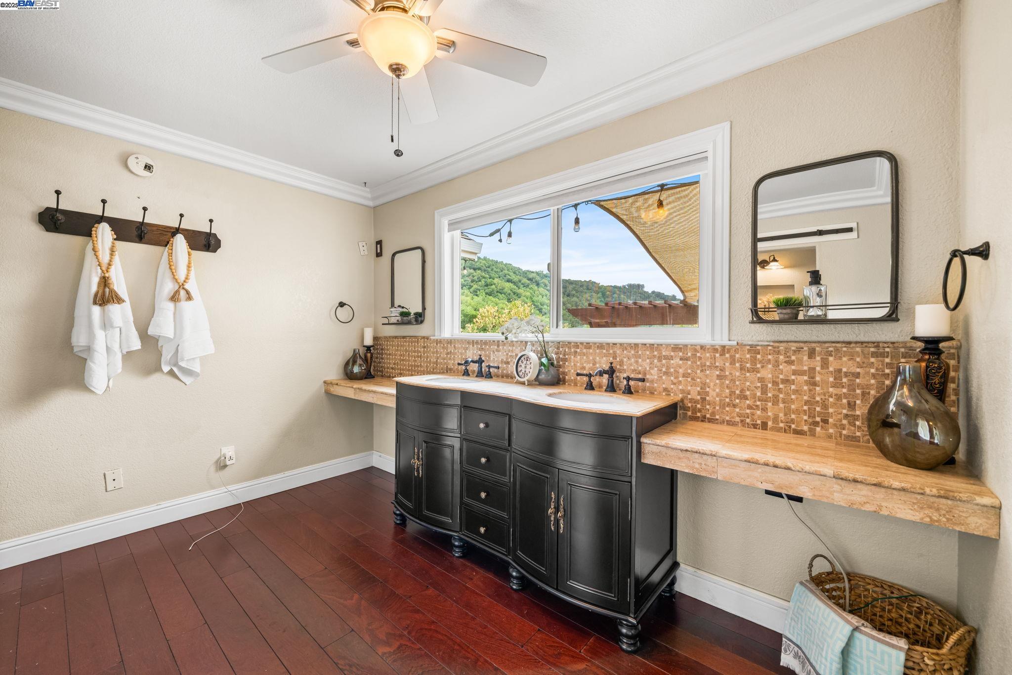 26928 Palomares Road Castro Valley, CA 94552 - Photo 34 of 58 a view of a sink and dishwasher with wooden floor
