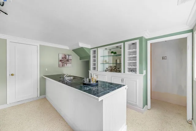 a view of a street with a building in the background