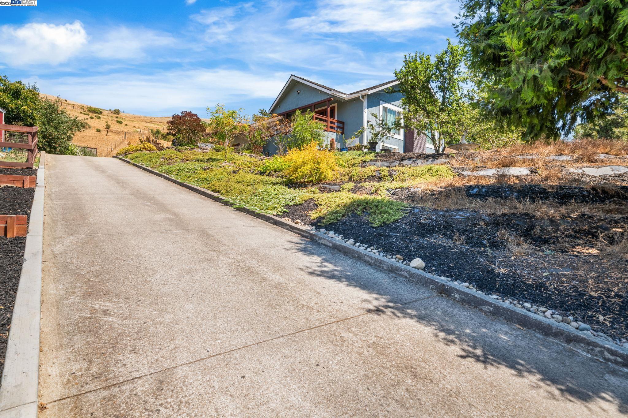 26928 Palomares Road Castro Valley, CA 94552 - Photo 5 of 58 a view of a yard and front view of a house