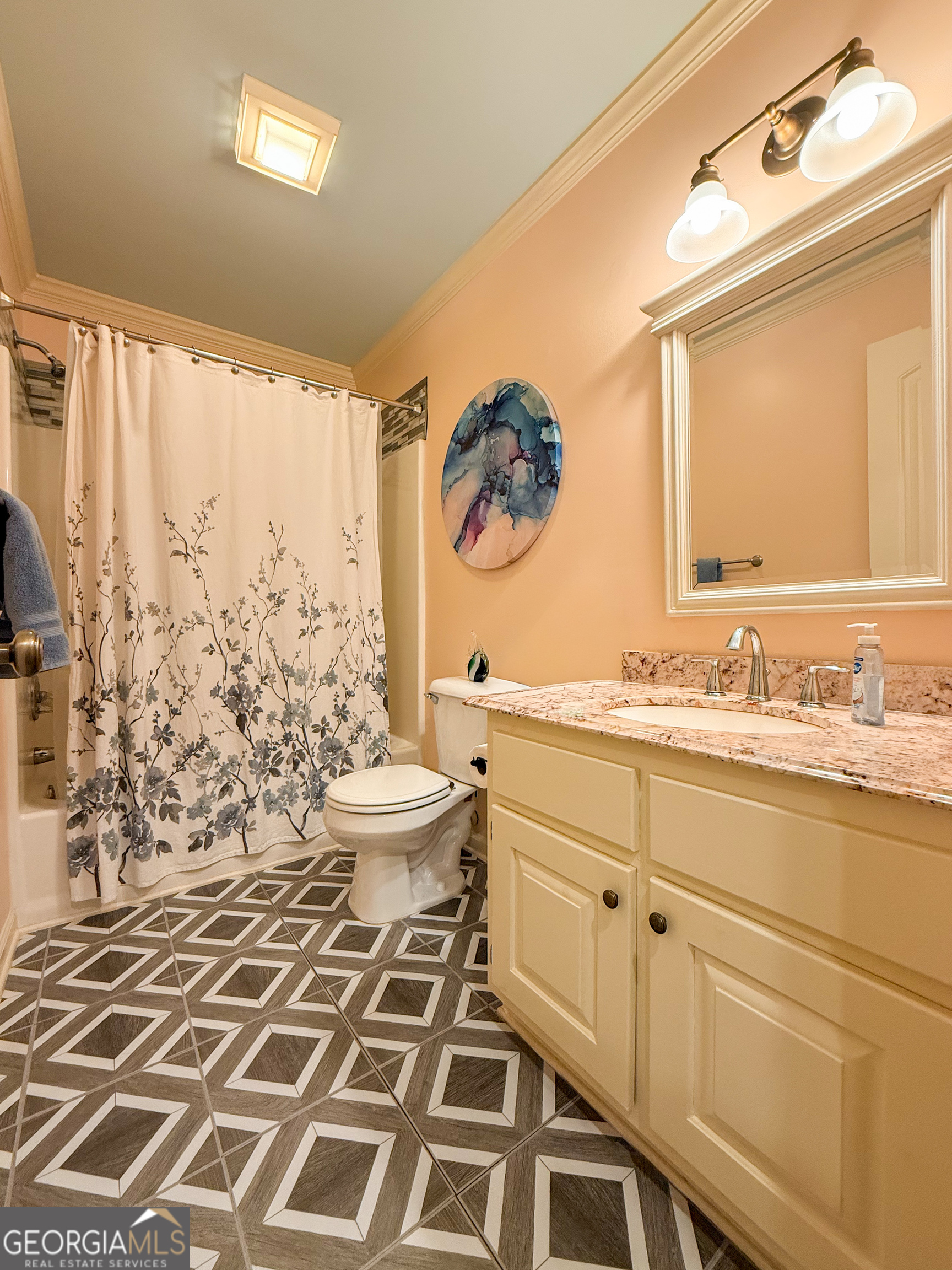 406 Yonah Mountain Road Cleveland, GA 30528 - Photo 18 of 65 a bathroom with a sink a toilet and a shower