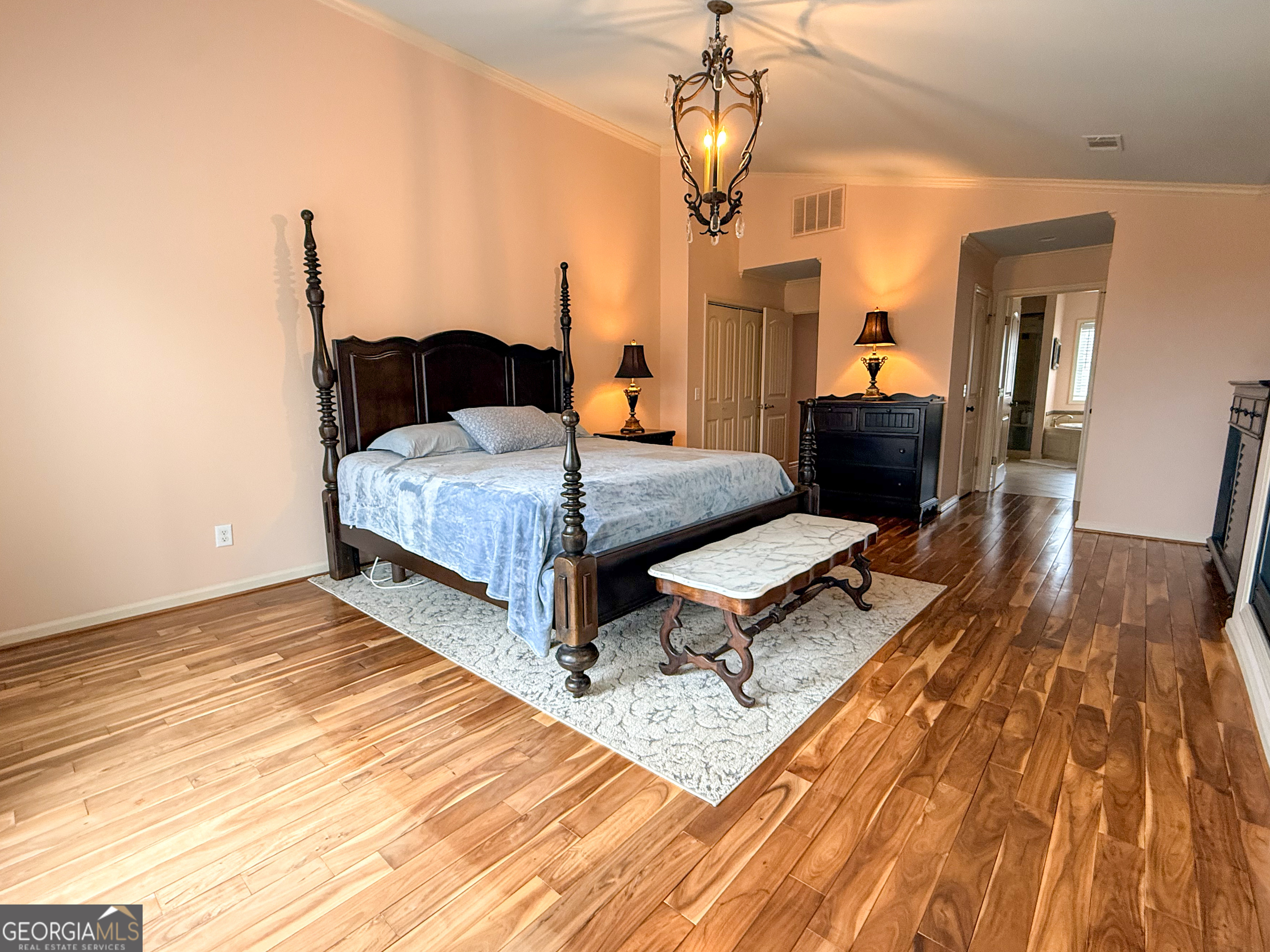 406 Yonah Mountain Road Cleveland, GA 30528 - Photo 24 of 65 a living room with a bed furniture and a flat screen tv