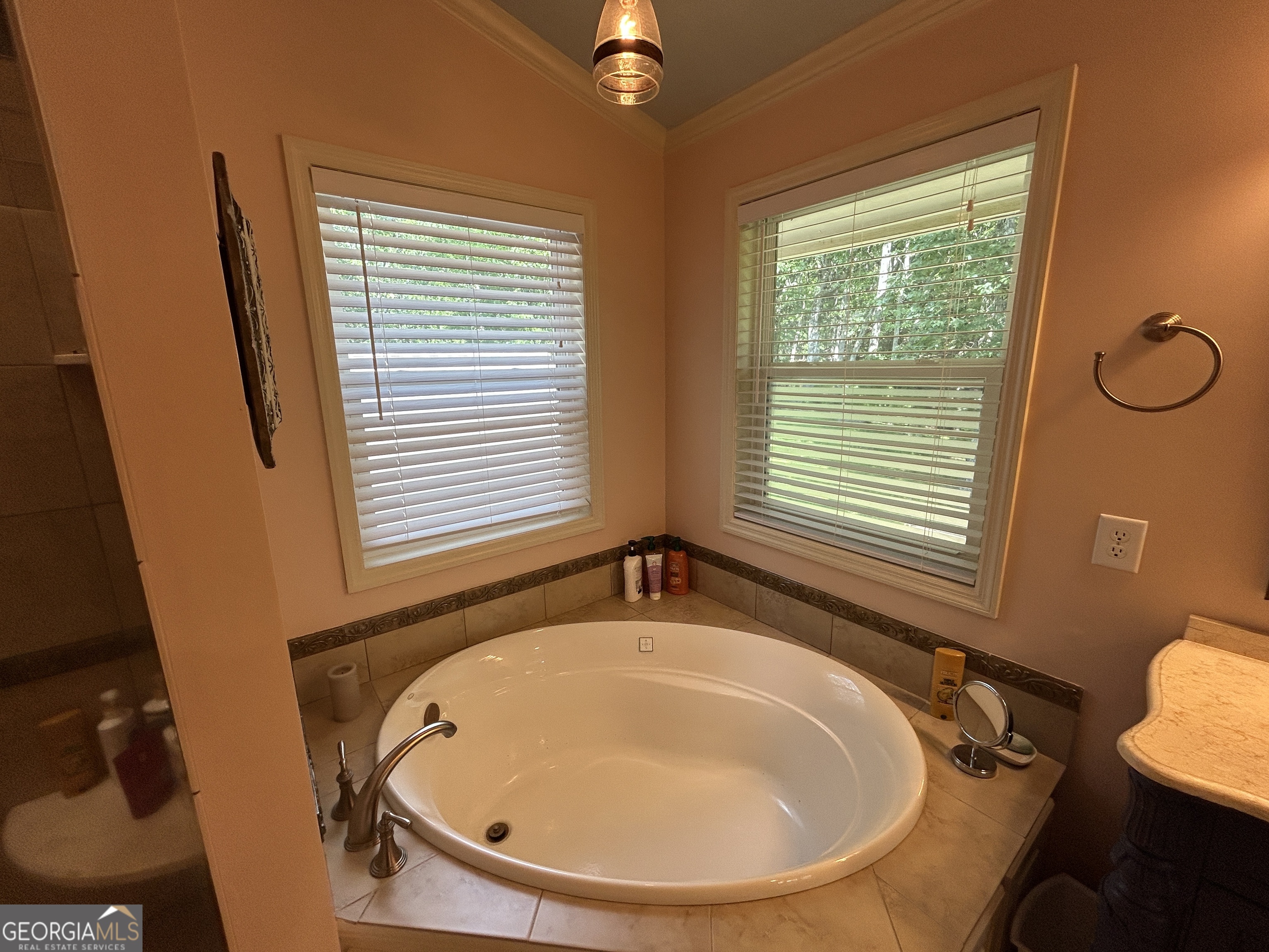 406 Yonah Mountain Road Cleveland, GA 30528 - Photo 29 of 65 a bathroom with a sink and a mirror