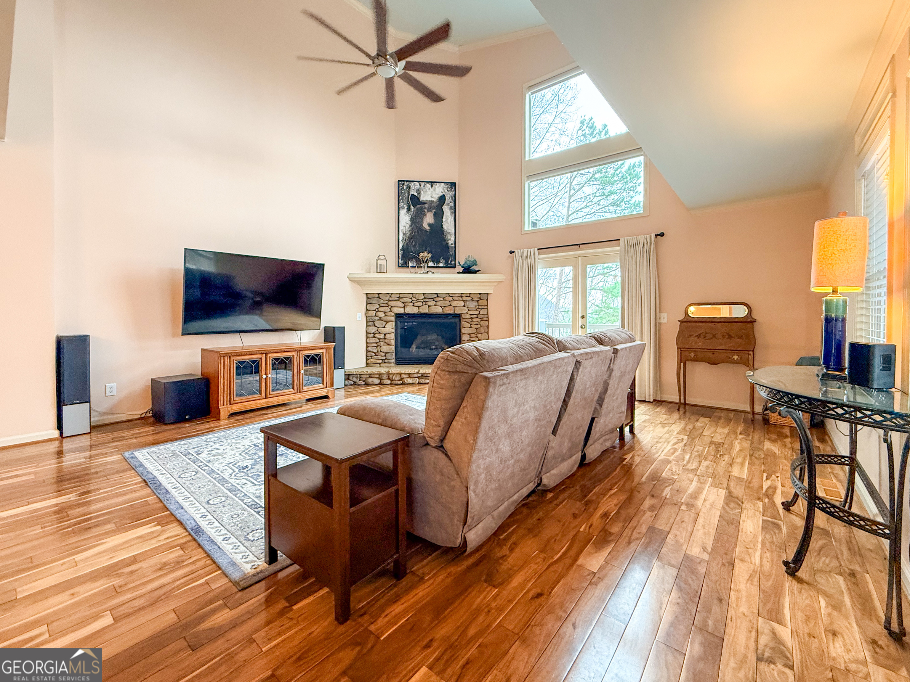 406 Yonah Mountain Road Cleveland, GA 30528 - Photo 3 of 65 a living room with fireplace furniture and a flat screen tv