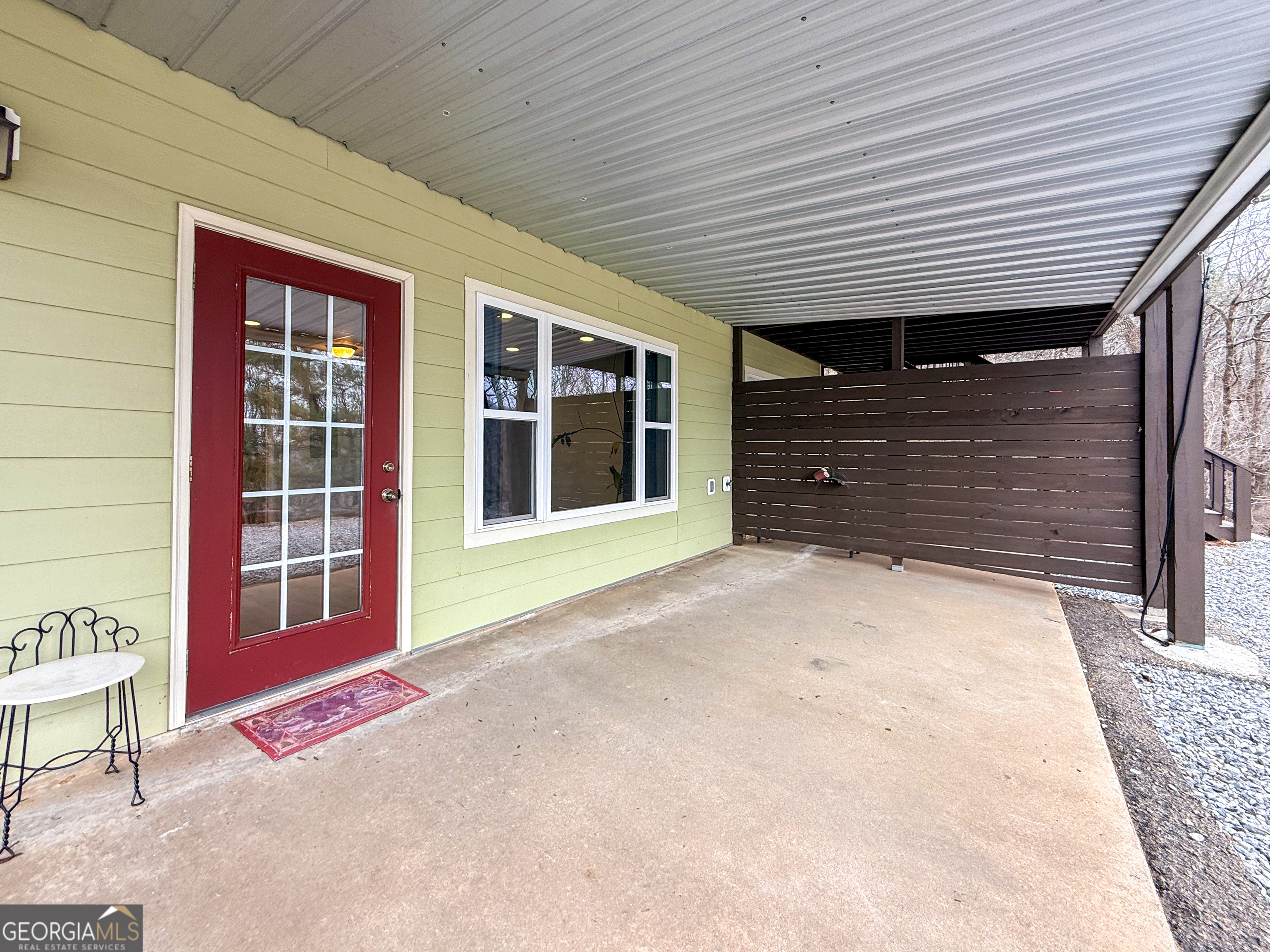 406 Yonah Mountain Road Cleveland, GA 30528 - Photo 40 of 65 a front view of a house with a garage