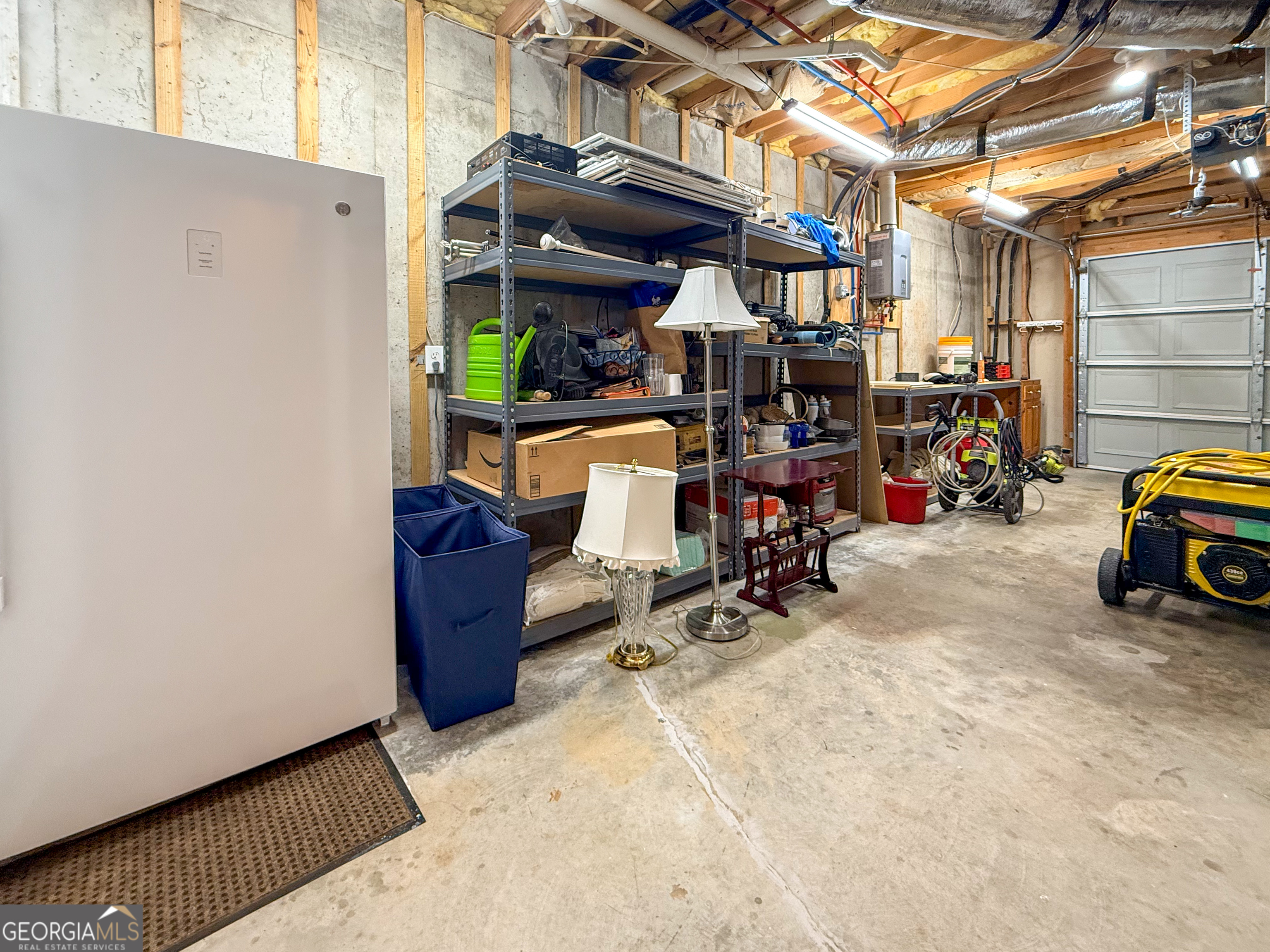 406 Yonah Mountain Road Cleveland, GA 30528 - Photo 48 of 65 a view of a storage room with a lot of stuff