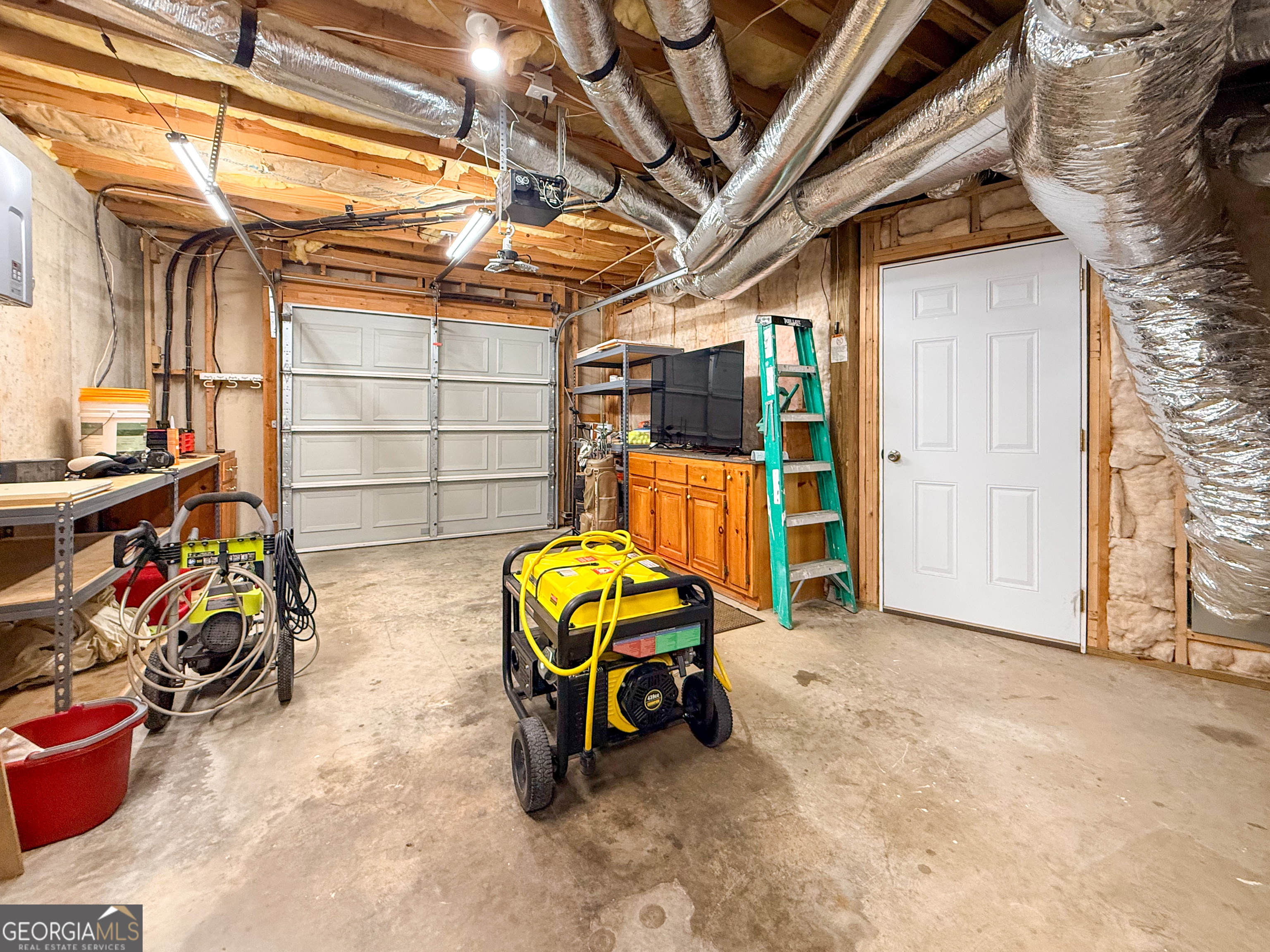 406 Yonah Mountain Road Cleveland, GA 30528 - Photo 49 of 65 a view of a garage with stuff
