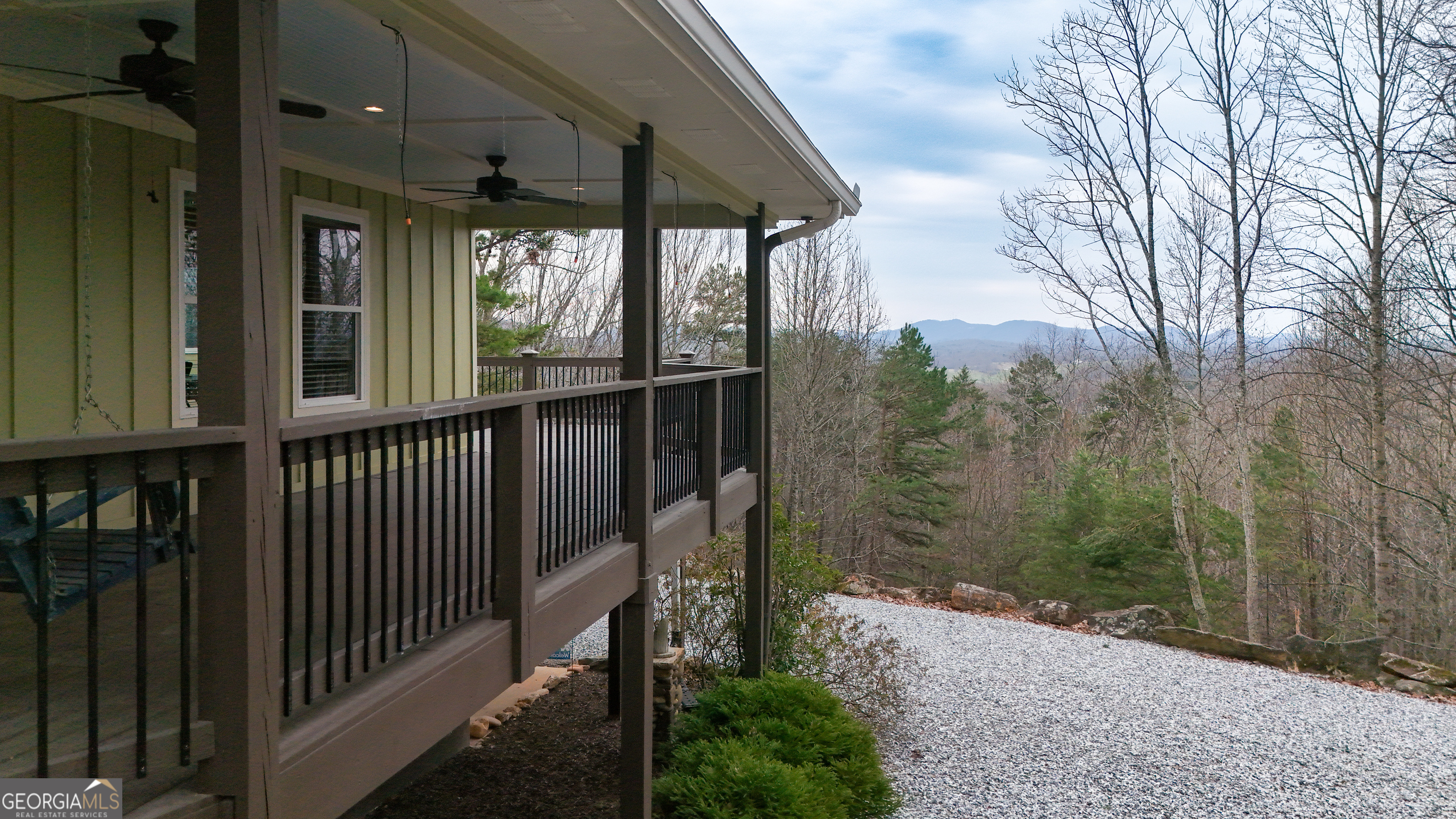406 Yonah Mountain Road Cleveland, GA 30528 - Photo 50 of 65 a view of a house with a porch