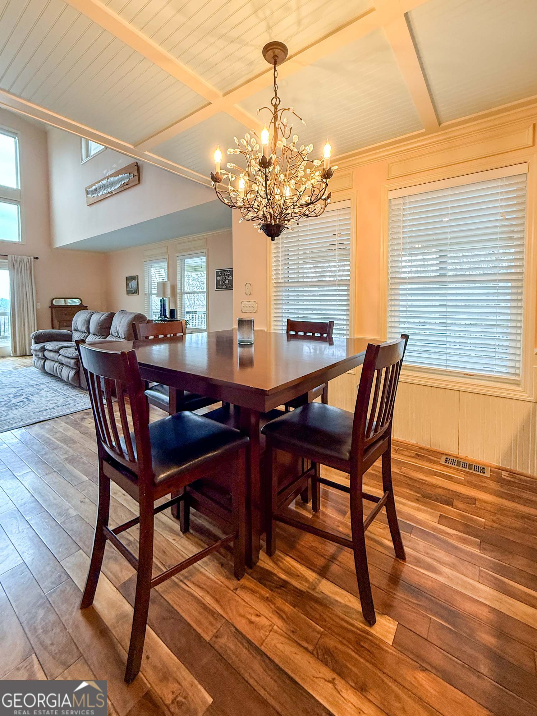 406 Yonah Mountain Road Cleveland, GA 30528 - Photo 6 of 65 a view of a dining room with furniture window and wooden floor