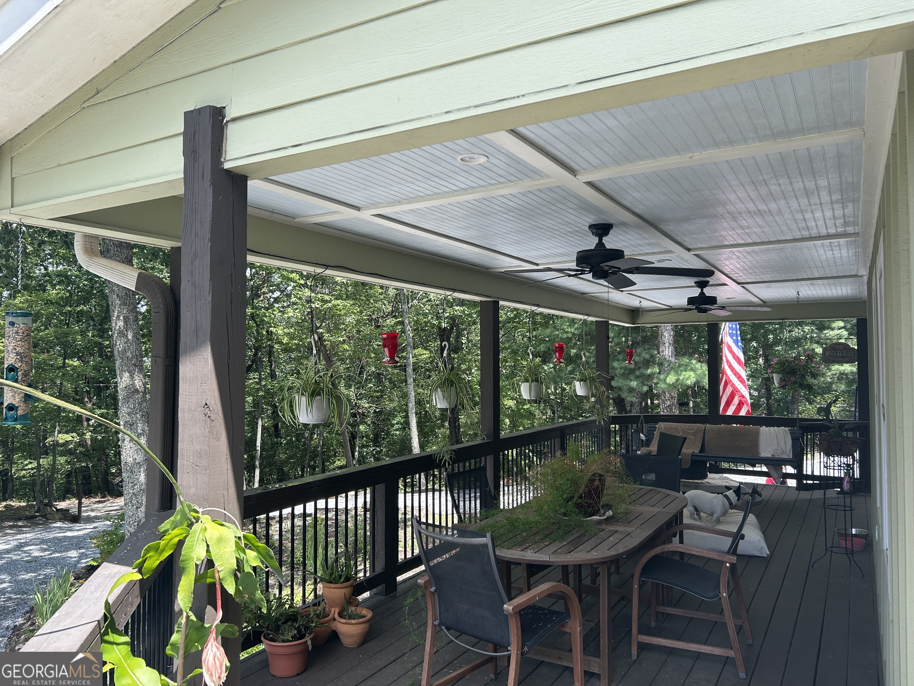 406 Yonah Mountain Road Cleveland, GA 30528 - Photo 63 of 65 a view of a porch with furniture and a yard
