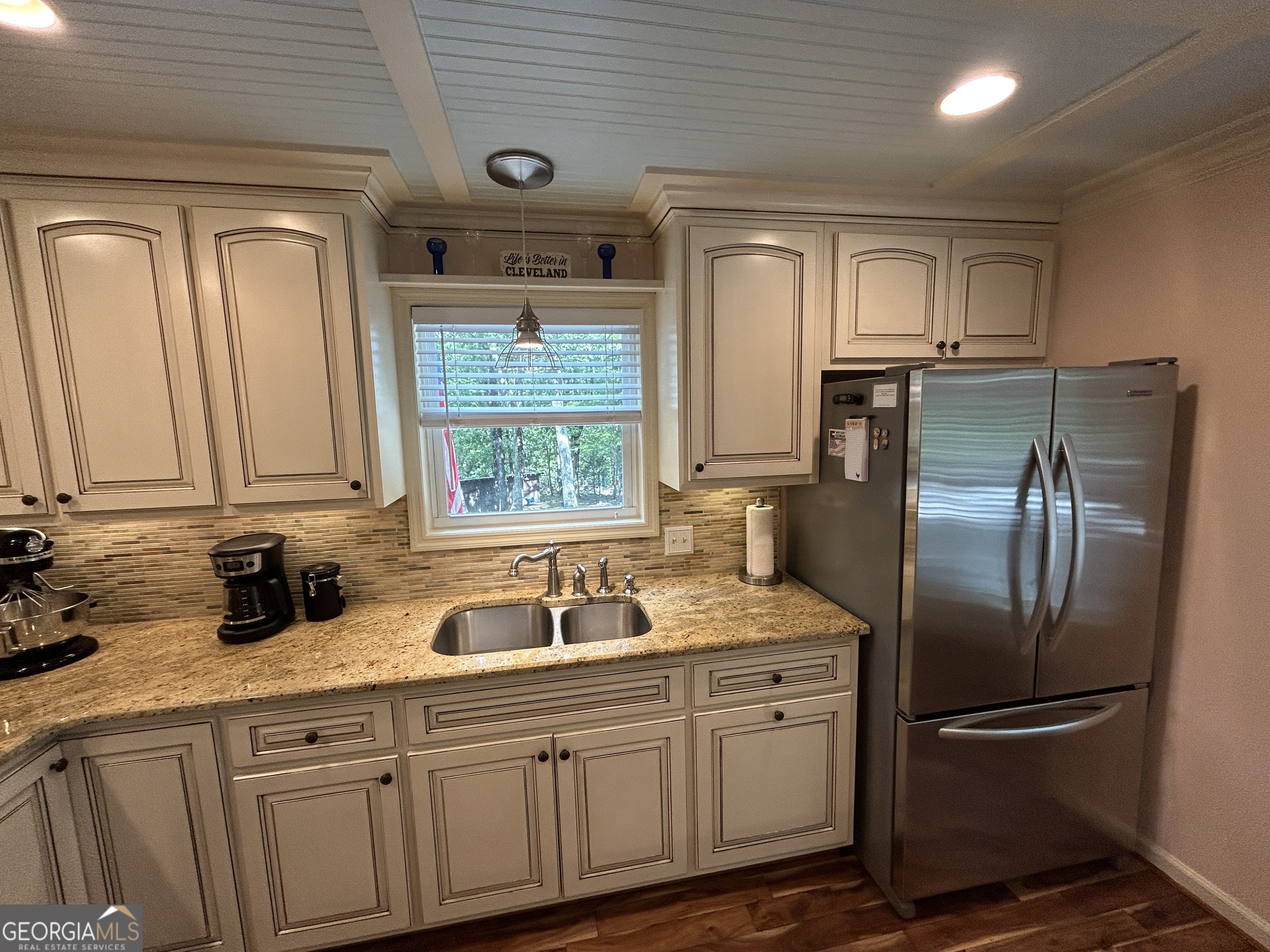 406 Yonah Mountain Road Cleveland, GA 30528 - Photo 8 of 65 a kitchen with appliances a sink and cabinets