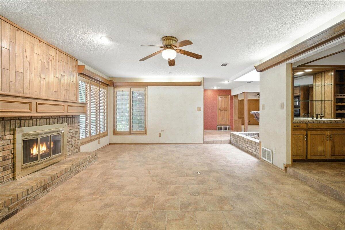 4615 91st Street Lubbock, TX 79424 - Photo 12 of 42 14-DRG09168_with_fire