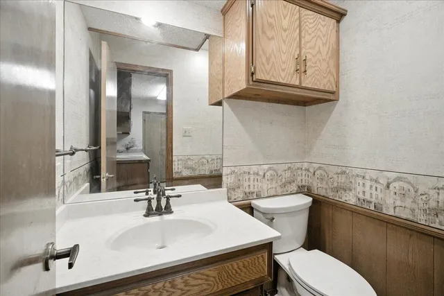 a bathroom with a sink and a toilet