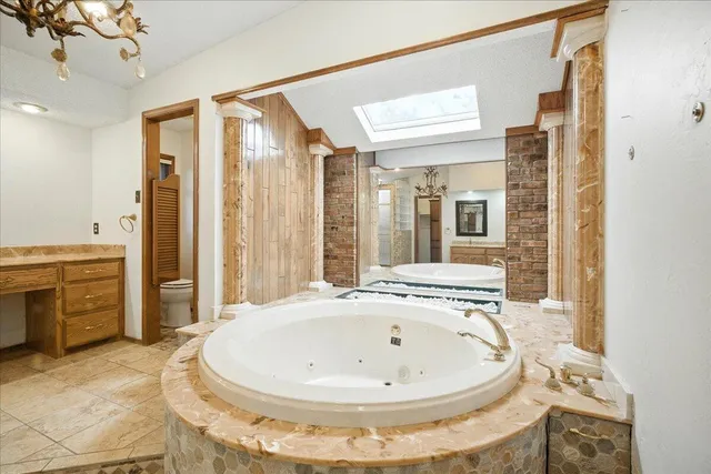 a view of a bathroom with a sink and a tub