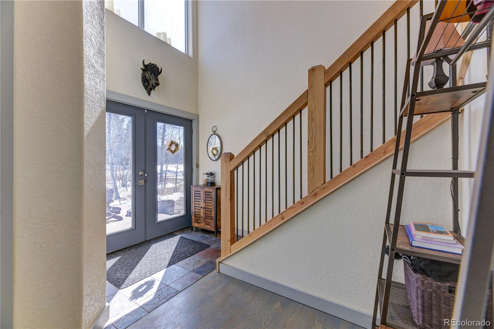 186 Thunder Ridge Road South Nederland, CO 80466 - Photo 14 of 50 a view of an entryway with a front door