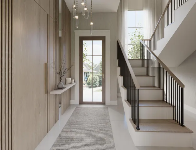 a view of entryway and hall with wooden floor