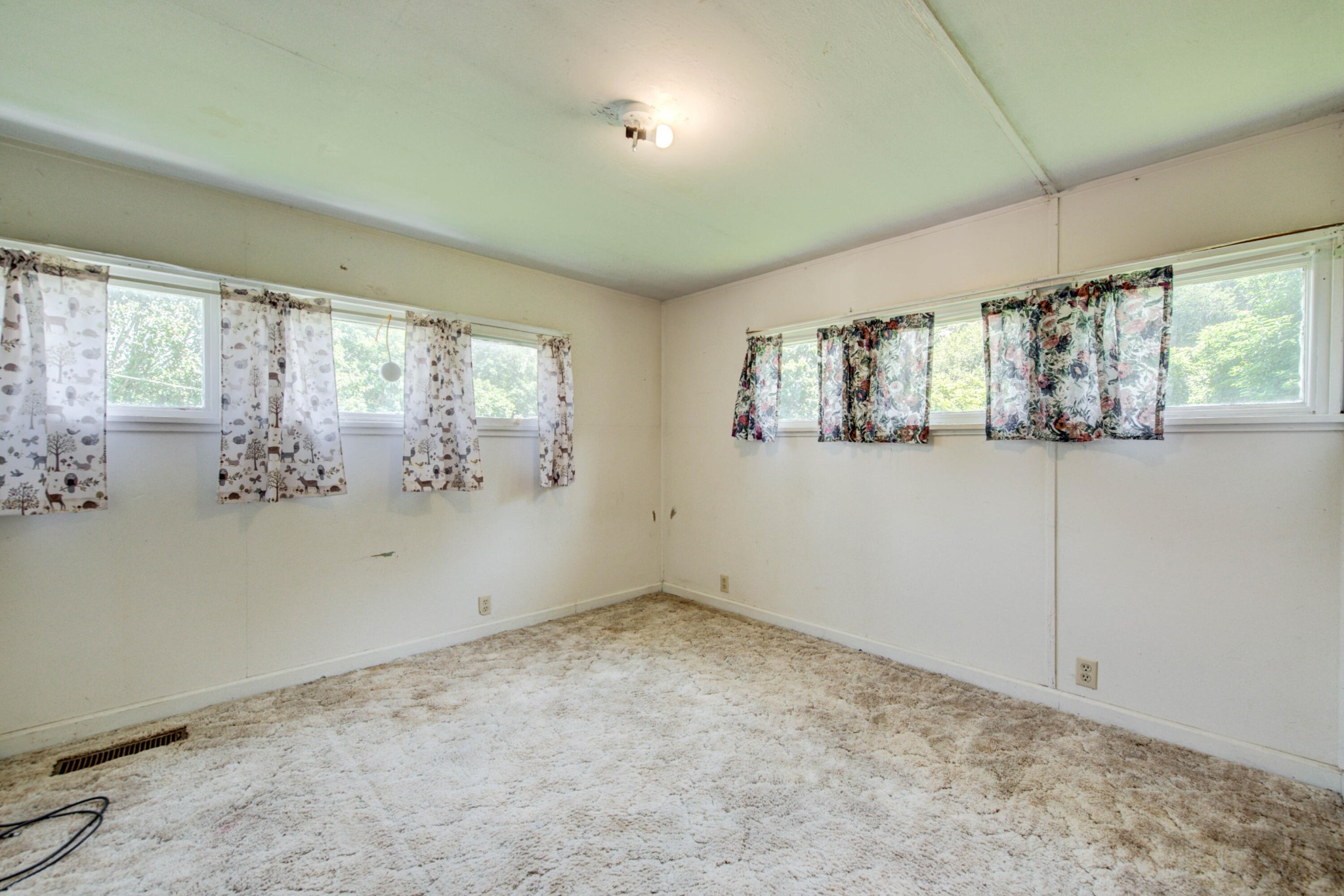 167 Johnson Road Oak Ridge, TN 37830 - Photo 14 of 15 a view of wooden floor and windows in a room