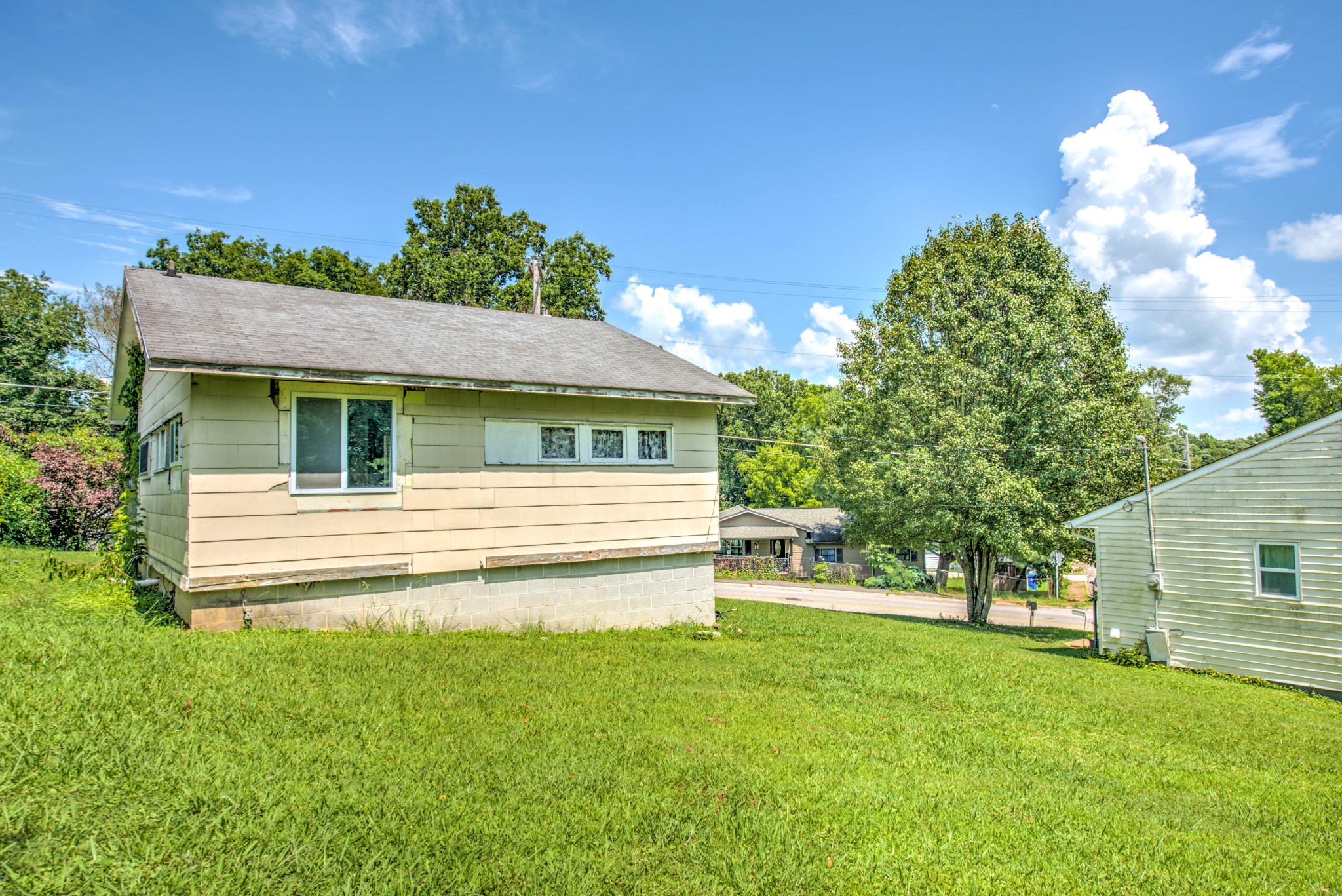 167 Johnson Road Oak Ridge, TN 37830 - Photo 3 of 15 a view of a house with a backyard