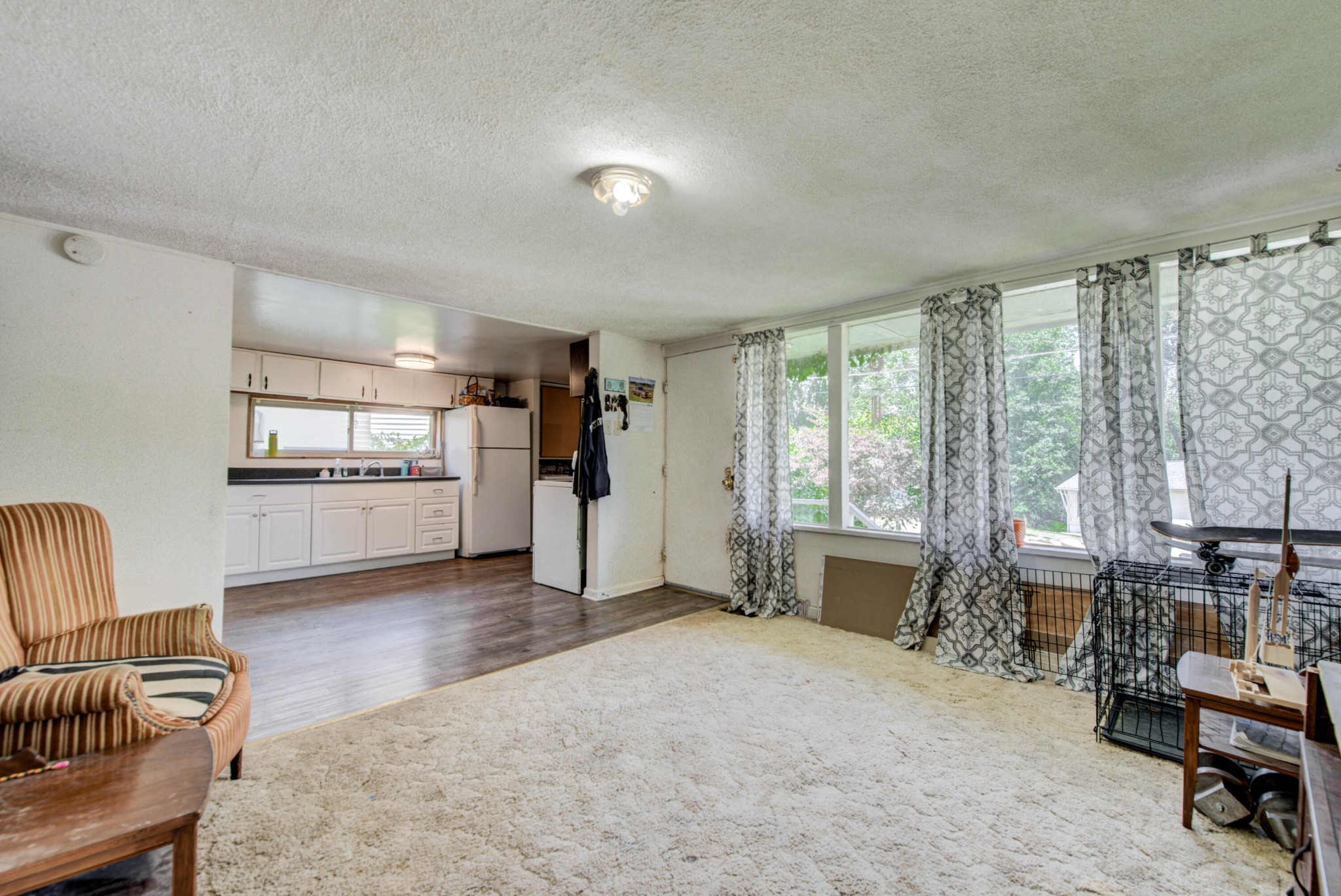 167 Johnson Road Oak Ridge, TN 37830 - Photo 7 of 15 a living room with furniture and large windows